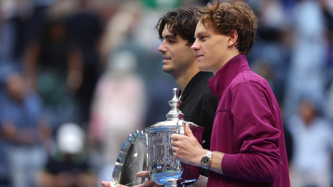 NEW YORK, NEW YORK - SEPTEMBER 08: Jannik Sinner (R) of Italy and Taylor Fritz of the United States pose for a photo following Sinner's Men's Singles Final victory on Day Fourteen of the 2024 US Open at USTA Billie Jean King National Tennis Center on September 08, 2024 in the Flushing neighborhood of the Queens borough of New York City. (Photo by Matthew Stockman/Getty Images)