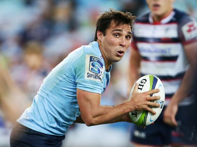SYDNEY, AUSTRALIA - APRIL 25: Nick Phipps of the Waratahs runs with the ball during the round 11 Super Rugby match between the Waratahs and the Rebels at ANZ Stadium on April 25, 2015 in Sydney, Australia. (Photo by Matt King/Getty Images)