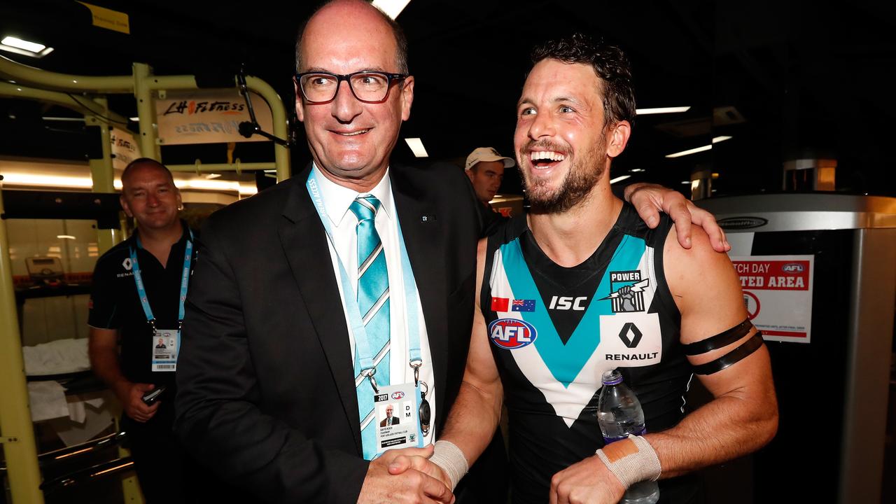 David Koch with Port star Travis Boak.