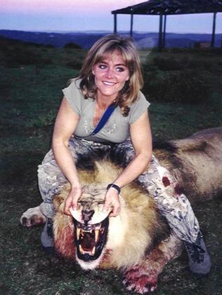 Rebecca Francis with a dead lion.