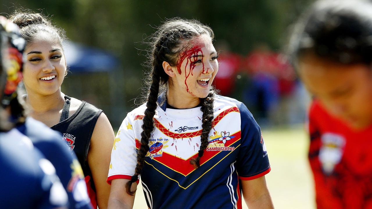 Lani Anderson from Philippines with an injury from the game. 16 Girls Tonga v Philippines. Harmony Nines Rugby League. Picture: John Appleyard