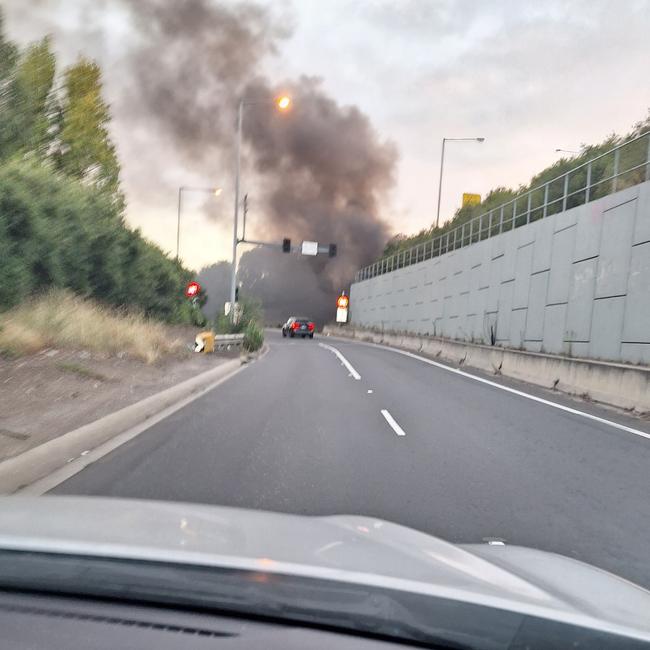 Smoke was heavy on the Tullamarine Fwy. Picture: Glenn P