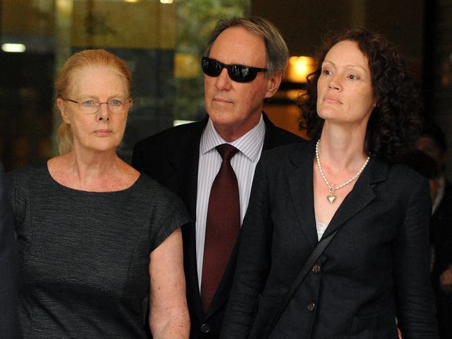 Hughes is supported by his wife Robyn Gardiner (left) and his daughter Jessica (right) at his 2014 trial. Picture: AAP/Dan Himbrechts