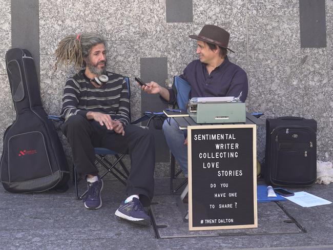 Is music the food of love? ... Trent Dalton in action on his city search for stories. Picture: Deborah Sovierzoski