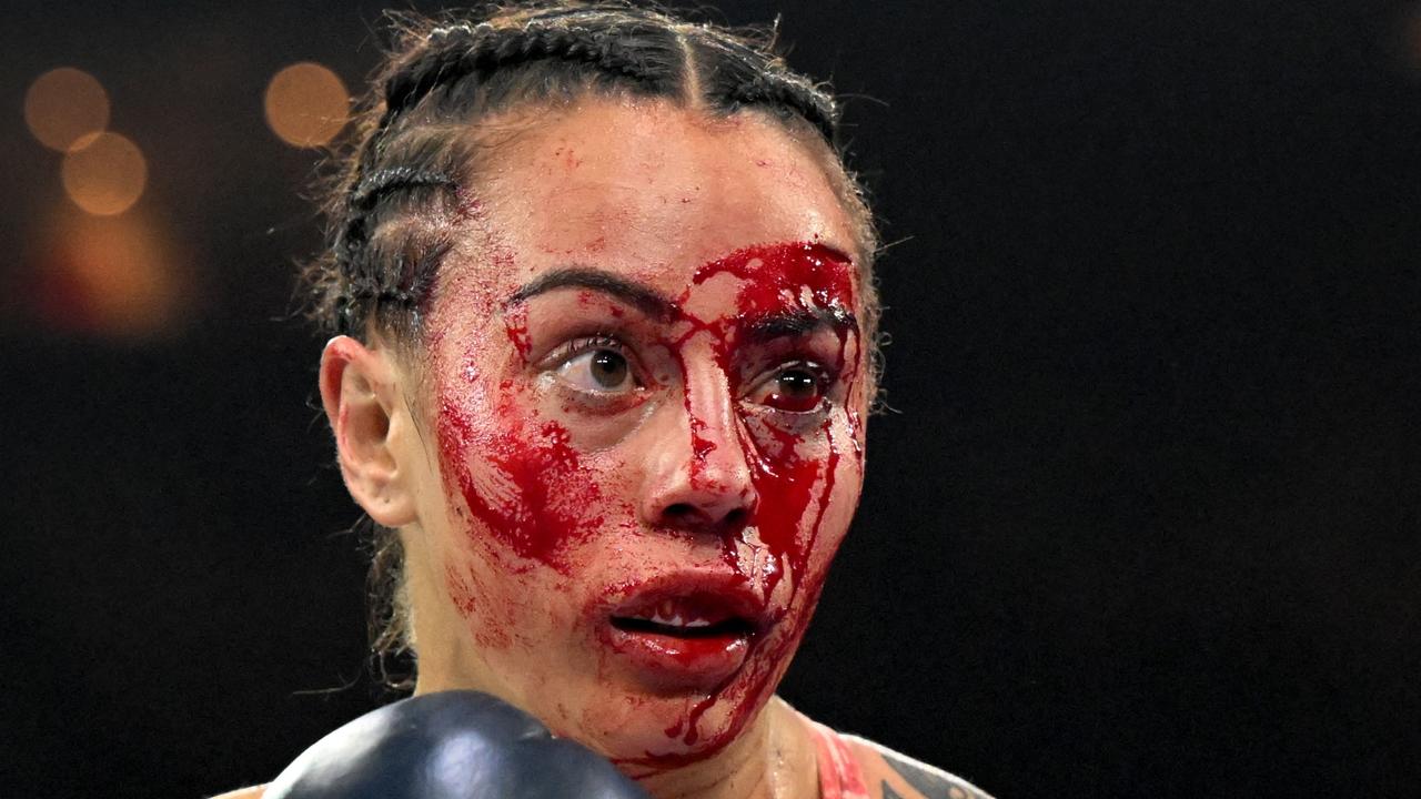 Cherneka Johnson isn’t afraid to mix it up in the ring. (Photo by William WEST / AFP)