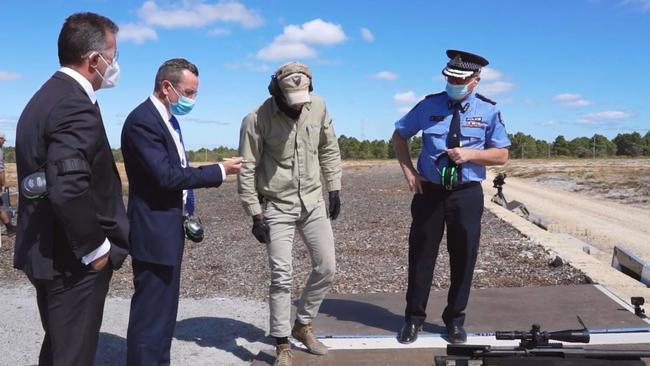 WA Premier Mark McGowan, Police Minister Paul Papalia and then police commissioner now WA Governor Chris Dawson attend a media event to announce their crackdown on weapons with the .50 Cal weapon WA Police purchased for the event. Picture: Twitter WA_Police