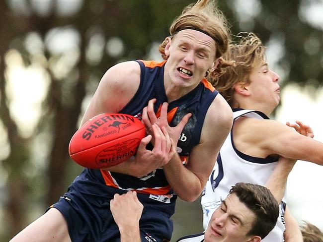 MELBOURNE, AUSTRALIA - APRIL 27: Mason Fletcher of Calder Cannons takes a pack mark during the round 05 NAB League Boys match between Calder Cannons and Geelong Falcons at RAMS Arena on April 27, 2019 in Melbourne, Australia. (Photo by Martin Keep/AFL Photos)