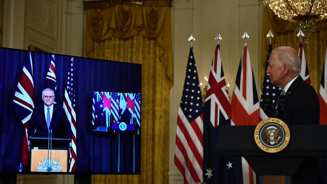 US President Joe Biden watches as Morrison speaks virtually on national security in East Room of the White House. Picture: Brendan Smialowski