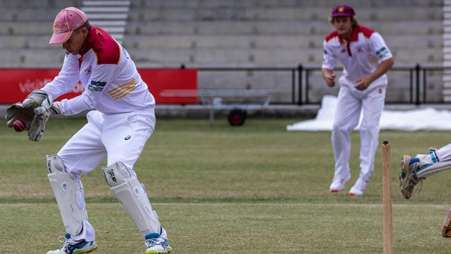 Alstonville wicketkeeper Kyle Yager takes a return from the outfield in Far North Coast LJ Hooker League cricket against Marist Brothers at Oakes Oval, Lismore.