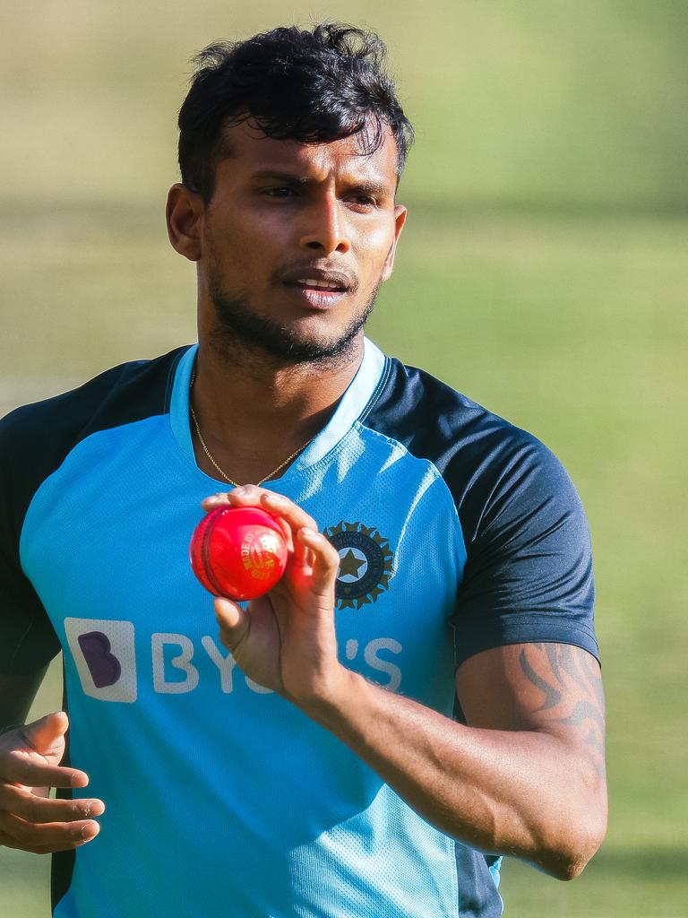 While Thangarasu Natarajan toils away in the nets. (Photo by Daniel Kalisz/Getty Images)