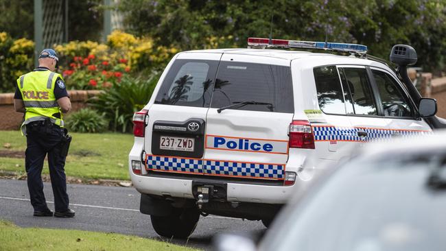 Investigators at a police incident in Harristown, Friday, May 6, 2022. Picture: Kevin Farmer