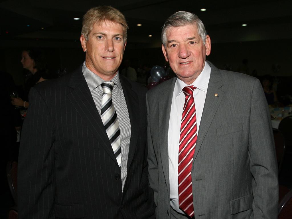 Rob Crow pictured in 2012 with then QRL chairman John McDonald AM.