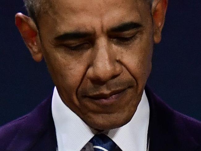 (FILES) In this file photo taken on December 2, 2017 former US President Barack Obama gestures as he speaks at an innovative communications conference organised by Les Napoleons network group, where he appears as a guest of honour, in Paris. Former president Barack Obama announced his support August 1, 2018 for several dozen Democratic candidates for Congress and state office, signalling he is "eager" to remain a political force through November's midterm elections. Amid obvious signs that President Donald Trump will hit the campaign trail for Republicans over the coming months, the nation's first African-American commander in chief is making it clear he too will campaign for several candidates ahead of the most anticipated midterm vote in years. / AFP PHOTO / Martin BUREAU