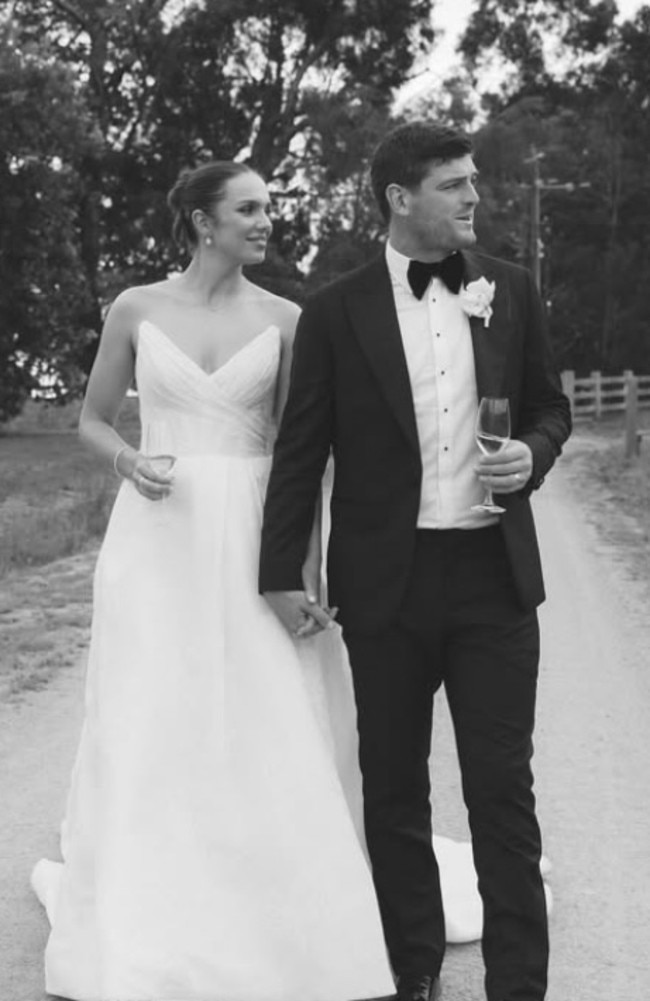 Danielle removes the sleeves off her Moira Hughes Couture gown for a second wedding look. Picture: Dear Fiore Photography