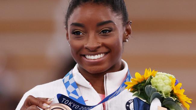 Simone Biles of Team United States poses with the bronze medal. Picture: Jamie Squire/Getty Images