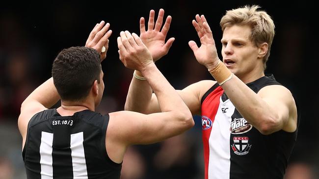 MELBOURNE, AUSTRALIA — AUGUST 28: Nick Riewoldt of the Saints is congratulated by Leigh Montagna of the Saints after kicking a goal during the round 23 AFL match between the St Kilda Saints and the Brisbane Lions at Etihad Stadium on August 28, 2016 in Melbourne, Australia. (Photo by Scott Barbour/Getty Images)