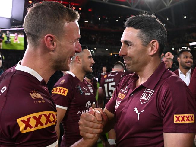 BRISBANE, AUSTRALIA - JULY 13: Billy Slater head coach of the Maroons and Daly Cherry-Evans of the Maroons celebrate victory during game three of the State of Origin Series between the Queensland Maroons and the New South Wales Blues at Suncorp Stadium on July 13, 2022 in Brisbane, Australia. (Photo by Bradley Kanaris/Getty Images)