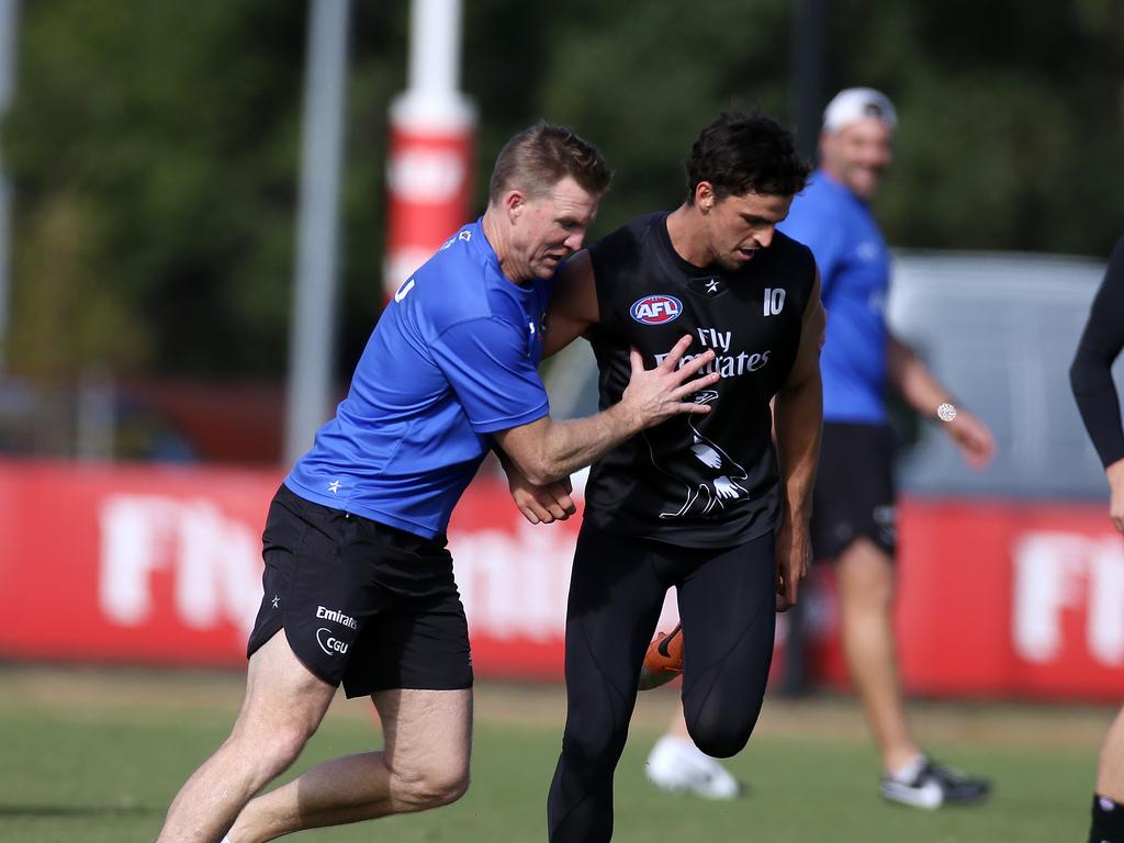 Scott Pendlebury and Nathan Buckley at Collingwood training in 2014. Picture: Wayne Ludbey