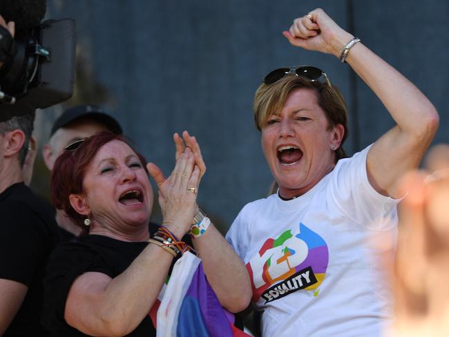Christine Forster, the sister of former Prime Minister Tony Abbott, celebrates after watching the same sex marriage vote result announcement during a picnic held by the Equality Campaign at Prince Regent Park in Sydney, Wednesday, November 15, 2017. Picture: AAP Image/David Moir