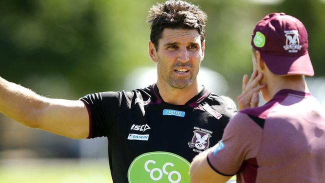 Trent Barrett talks to Daly Cherry Evans at Manly training. Picture: Gregg Porteous