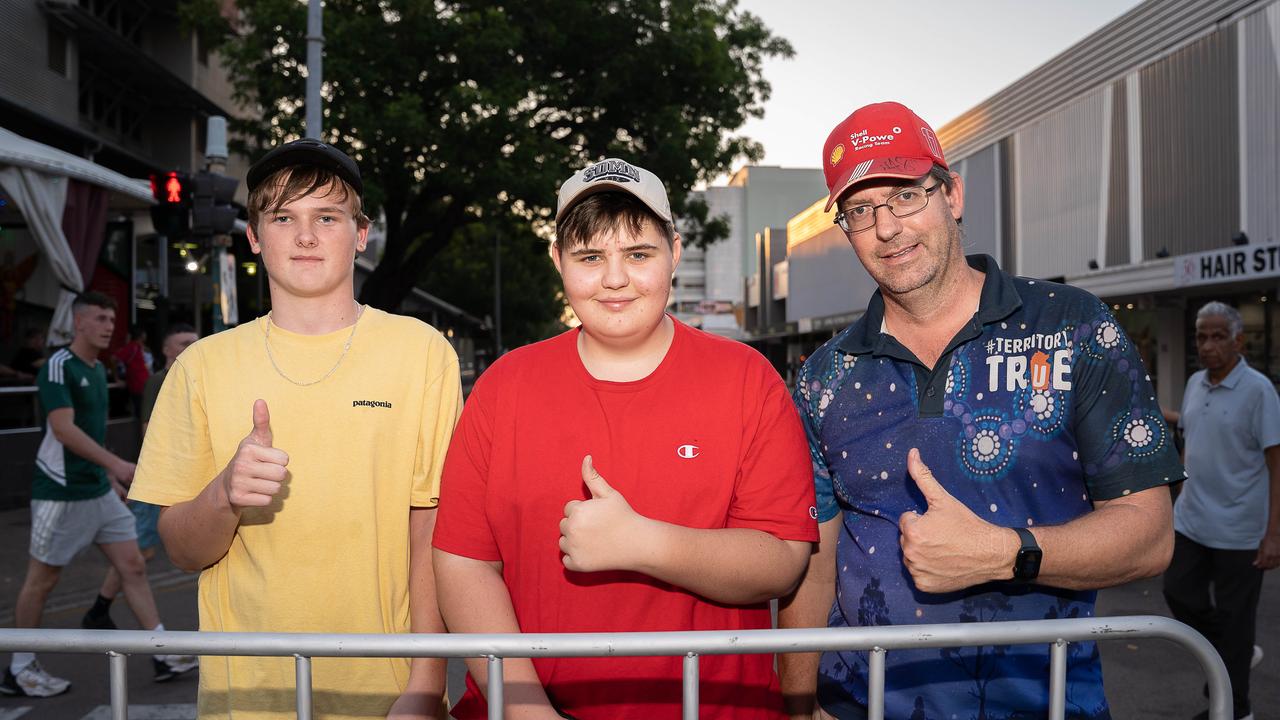 Bailey Briggs, Mac McMaster and Aaron McMaster were among thousands of racing fans welcomed the Night Transporter Convoy into the Darwin CBD ahead of the 2023 Darwin Supercars. Picture: Pema Tamang Pakhrin