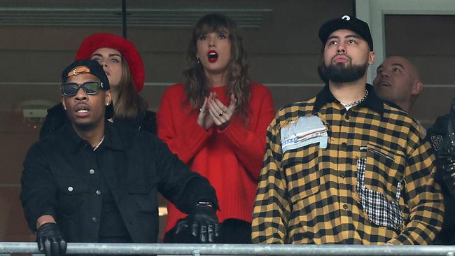 Cara Delevingne, Taylor Swift and Ross Travis look on during the second quarter in the AFC Championship Game between the Baltimore Ravens and the Kansas City Chiefs at M & T Bank Stadium on January 28, 2024 in Baltimore, Maryland. Picture: Getty﻿
