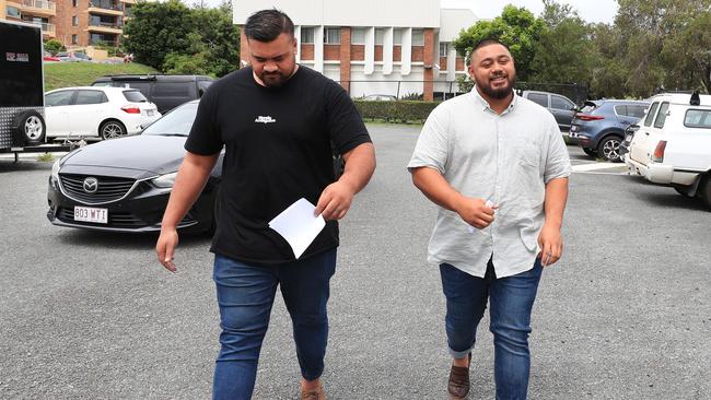 Earnest Lotomau and Tithing Faagase leave Coolangatta Courthouse after incorrectly filling out a border declaration form. Photo: Scott Powick