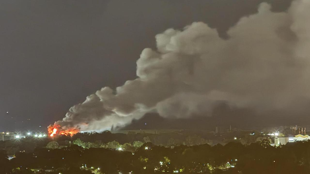 A total of 11 Queensland Fire Department were tasked with containing a major inferno that engulfed the main building of the Portsmith Transfer Station. Picture: Supplied