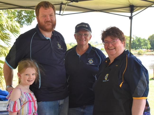 Samara Zirbel with Blue River Mackay Lions Club INC Jason Barfield, Audrey Kenny and Josephine Barfield keeping people fed at the Reef Catchment Tilapia Takedown at North Mackay Gooseponds, September 2021. Picture: Lillian Watkins