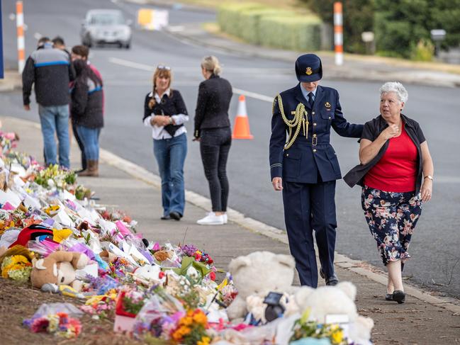 Devonport Mayor Annette Rockliff inspects the tributes. Picture: Jason Edwards