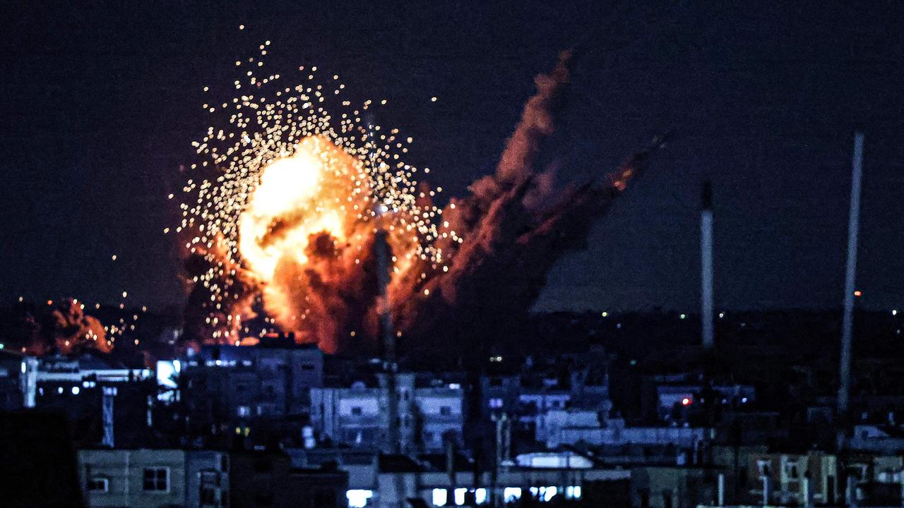 A ball of fire and smoke rise above buildings during an Israeli strike on Rafah in the southern Gaza Strip, on October 15. Picture: SAID KHATIB / AFP