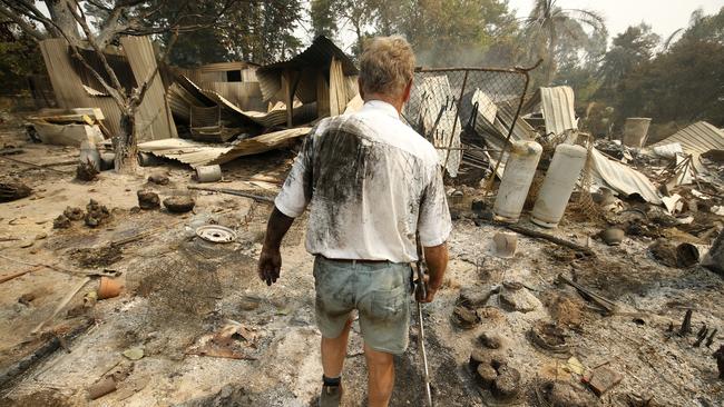 Thousands of homes have so far been destroyed by fires, including this property in Tonimbuk, Gippsland. Picture: Darrian Traynor/Getty Images)