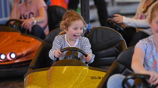 Georgia testing out the dodgem cars. Picture: Tom Huntley