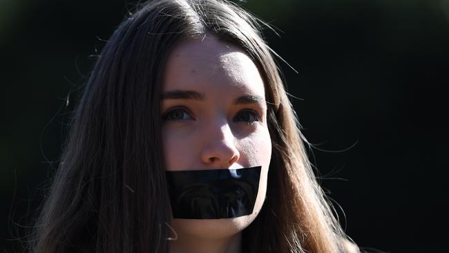 A student of the Australian National University participates in a protest today after the release of the report on sexual assault and harassment. Picture: Lukas Coch/AAP