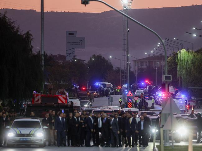 Police and emergency services swarm the entrance of the Turkish Aerospace Industries facility. Picture: Getty Images.