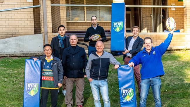 AAP Northern District Times L front Clr Peter Kim – Clr Sarkis Yedelian OAM-Clr Roy Maggio – Clr Trenton Brown rear L Clr Simon Zhou -back middle Clr Chris Moujalli – Clr Jordan Lane holding the goal postÃ&#138;Ã&#138;coverÃ&#138;Ã&#138;pose for a photo at Harry Anderson Park Pavilion in Ryde Park on Friday, 26 June 2020. The Council waives fees for sports clubs. (AAP Image / Monique Harmer)