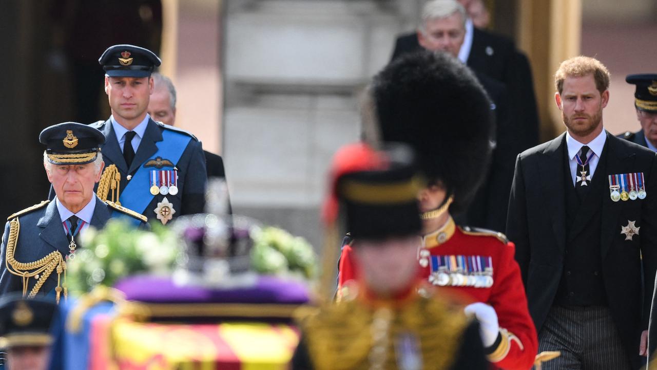 Britain's King Charles III, Prince William, Prince of Wales and Prince Harry, Duke of Sussex walk behind the coffin of Queen Elizabeth II. Picture: AFP.