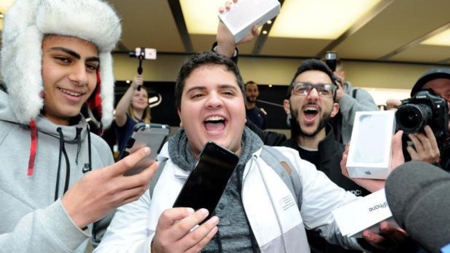 Marcus Barsoum enjoying the media attention, with Mazen Kourouche behind him.