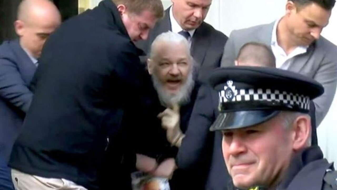 Assange (above being arrested last month) was sentenced at Southwark Crown Court in London after seeking asylum at the Ecuadorean embassy in 2012.