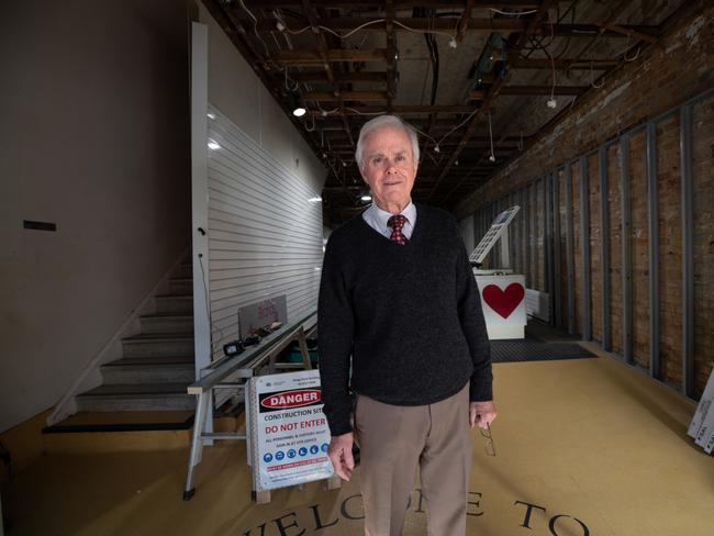 Greg Brand from Brands Pharmacy Lismore is flood proofing his shop so he can hose it down after the next flood. Picture: Danielle Smith