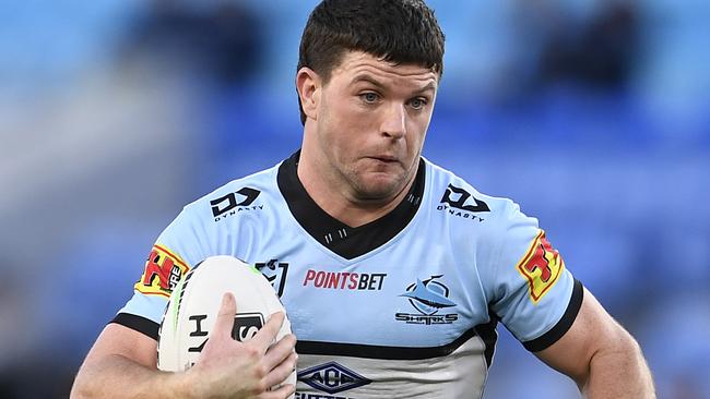 GOLD COAST, AUSTRALIA - JULY 04: Chad Townsend of the Sharks runs the ball during the round eight NRL match between the Gold Coast Titans and the Cronulla Sharks at Cbus Super Stadium on July 04, 2020 in Gold Coast, Australia. (Photo by Ian Hitchcock/Getty Images)