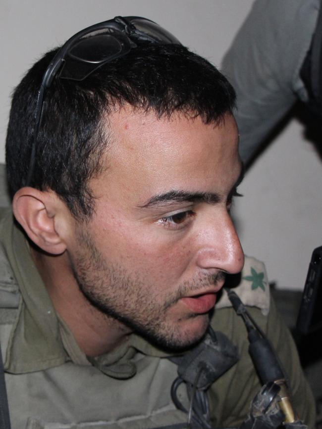 Lieutenant-Colonel Tal Tourjeman, an infantry battalion commander in the 36th Division, giving an interview in a house held by his troops in Shejaia, Gaza.