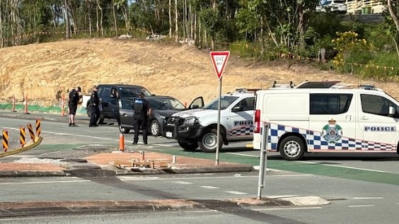 The stolen Mazda being checked by police for fingerprints. Photo: Jarrod Tutbury