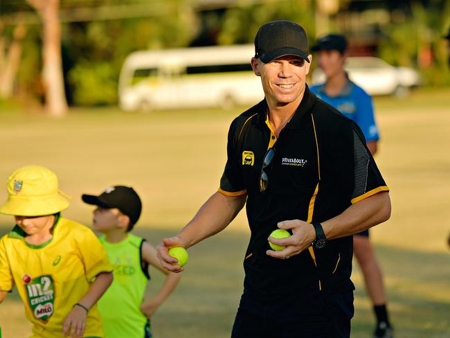 Australian cricketer David Warner drops into a Milo cricket clinic.
