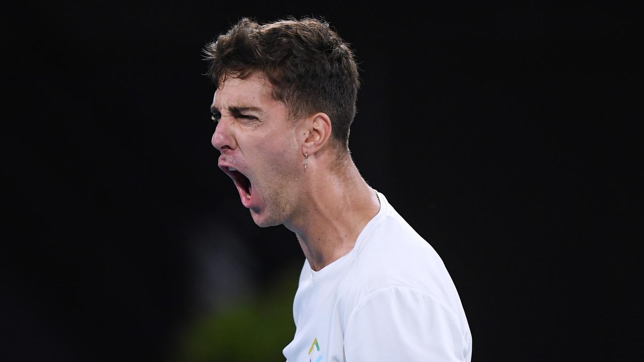 Thanasi Kokkinakis had to fight but eventually had to plenty to celebrate on Thursday night. Picture: Getty Images