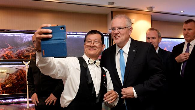 Prime Minister Scott Morrison poses for photographs at the Golden Century. Picture: Getty