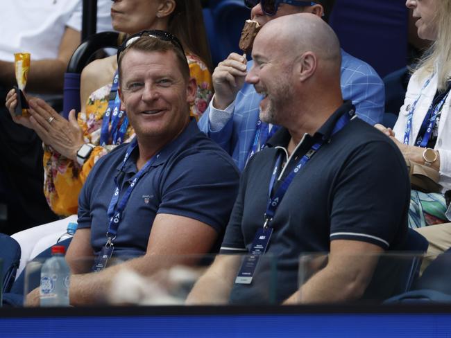 Carlton coach Michael Voss and president Luke Sayers watching Jannik Sinner at the Australian Open semi final. Pic: Michael Klein