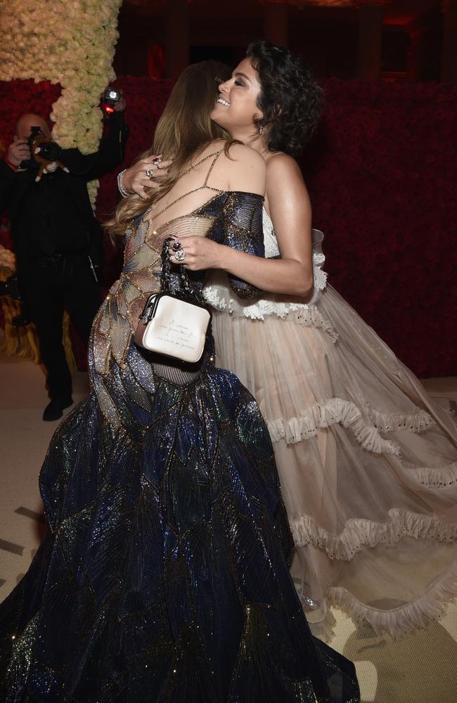 Gigi Hadid and Selena Gomez were probably trying to ignore their shared connection to The Weeknd. Picture: Kevin Mazur/MG18/Getty Images for The Met Museum/Vogue