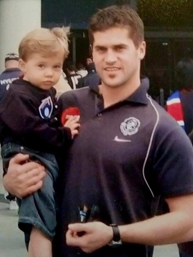 Carlton debutant Lachie Cowan, with father Graham at a Carlton game when he was 18 months old.