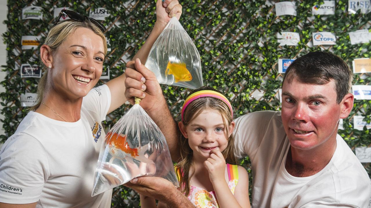 Tammy, Todd and daughter Madison Patch get ready for their Australia Day goldfish race and auction raising funds for the Children's Hospital Foundation in memory of their daughter and sister, Sophie Grace, Tuesday, January 23, 2024. Picture: Kevin Farmer